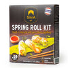 Siam Spring Roll Kit packaging with spring rolls, dipping sauce, and chopsticks on a wooden surface.